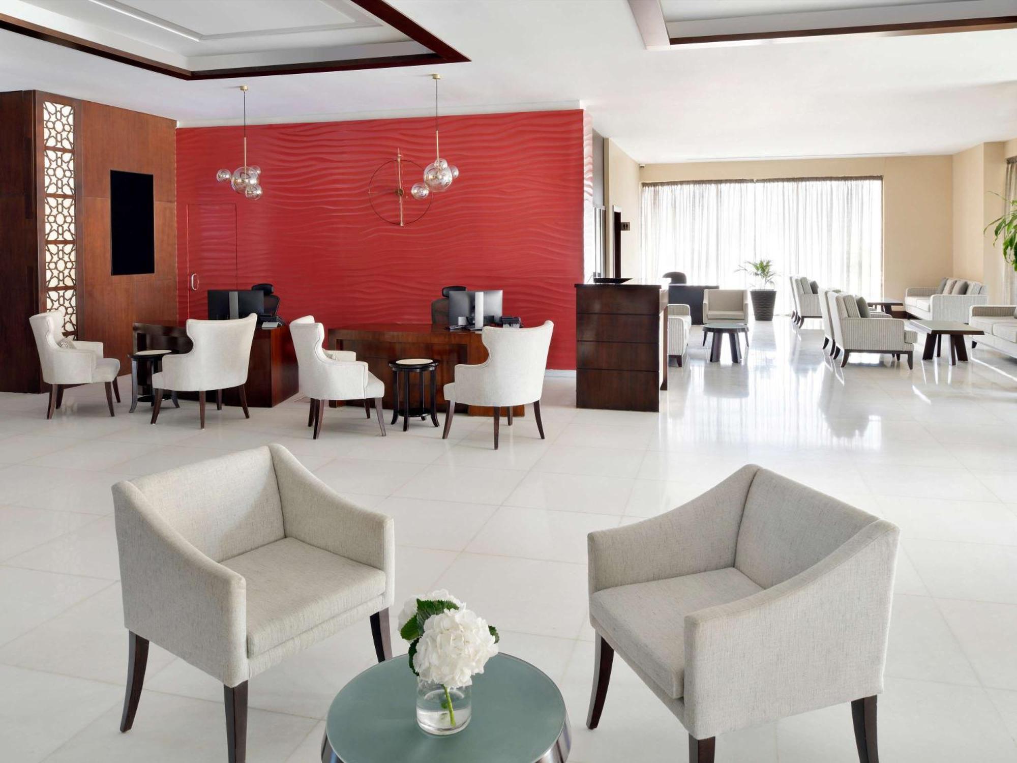 Moevenpick Hotel Apartments Al Mamzar Dubai Esterno foto Lobby